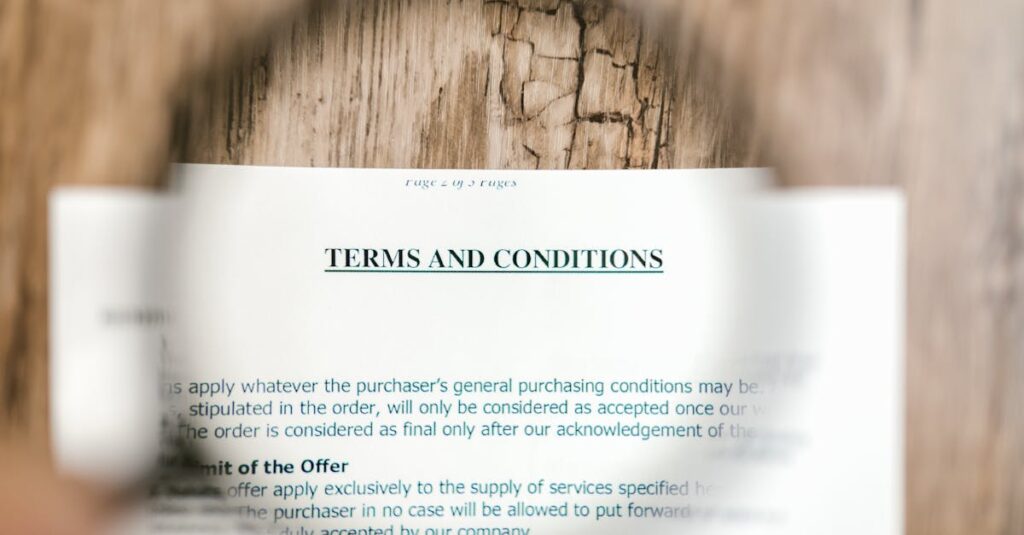 Magnifying Glass Focusing On Terms And Conditions Document On Wooden Surface